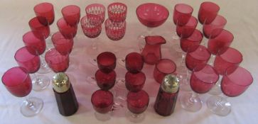 Selection of cranberry glass inc wine glasses and sugar shakers