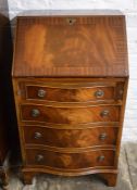 Small reproduction Regency bureau with serpentine front Ht 96cm W 54cm D 44cm