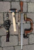 Holdall containing wooden brace, large rasp, lump hammer etc.