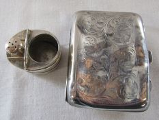 Ornate silver cigarette case Birmingham 1925 weight 1.73 ozt and a small silver salt and pepper