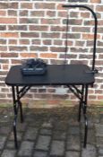 Folding dog grooming table with Wahl clippers