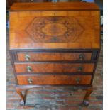 Early 20th century bureau on ball & claw feet.