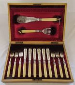 Cased set of fish knives and forks and a boxed set of 12 Art Deco glass knife rests (3 af)