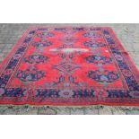 Turkey red wool carpet (some wear) 276cm x 231cm