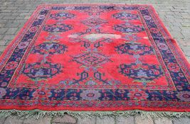 Turkey red wool carpet (some wear) 276cm x 231cm