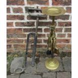 A tall brass fireside companion set & a stirrup pump