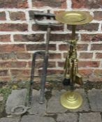 A tall brass fireside companion set & a stirrup pump