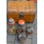 4 paraffin lamps & an old tin trunk