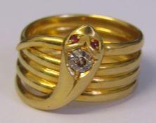 18ct gold and diamond snake ring, diamond approximately 0.20 ct with ruby set eyes, total weight