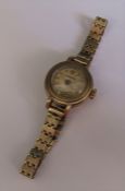 9ct gold Ladies Longines watch, 17 jewels, no 7814267 with 9ct gold strap, total weight 16.3 g