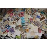 Approximately 1kg of loose World stamps & taxidermy mink stole