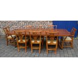 Regency style dining table with 2 leaves, yew wood veneer top and 8 chairs inc 2 carvers in the