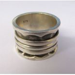 Contemporary silver ring with 3 central moveable rings size P/Q weight 0.36 ozt / 11.46 g