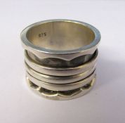 Contemporary silver ring with 3 central moveable rings size P/Q weight 0.36 ozt / 11.46 g