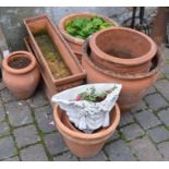 Various terracotta planters & a wall pocket
