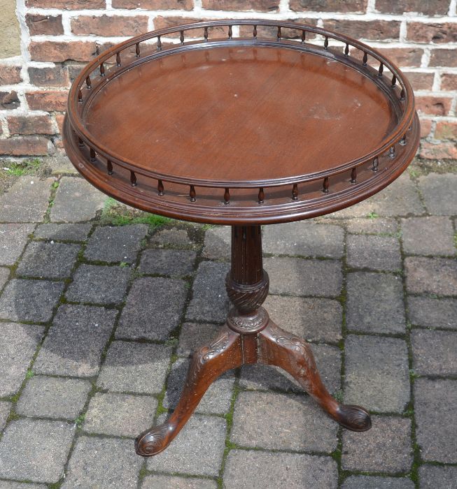 Reproduction mahogany Chippendale style circular table with gallery