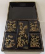 Chinese lacquered and gilt decorated box containing 5 smaller lacquered boxes 30 cm x 27 cm x 9