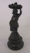 Bronze figurine of a girl with fruit and flower baskets H 24 cm