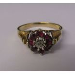 9ct gold ruby and diamond cluster ring size T, total weight 4.02 g