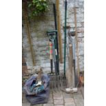 Selection of gardening & hand tools including forks, spades & a sledge hammer