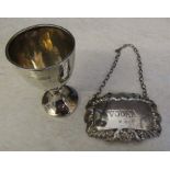 Silver 'Vodka' drinks / decanter label London 1968 weight 0.43 ozt and a small silver cup  / egg cup