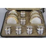 Cased early 20th century Aynsley coffee set with silver mounts Sheffield 1926, silver total 4.86