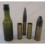 4 shell cases inc WWI and a Sheffield bottle