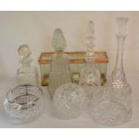 4 glass decanters, 3 glass bowls & a candle holder