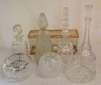 4 glass decanters, 3 glass bowls & a candle holder