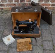 Singer electric sewing machine in a case