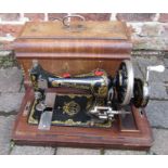 Frister & Rossmann sewing machine and contents c.1877 (with key)