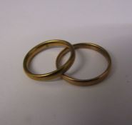 2 9ct gold band rings size J and N weight 3.83 g