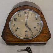 Art Deco mantel clock in an oak case with a Westminster chime maker Gufa West Germany