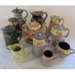 Various pewter lidded ceramic jugs and teapots etc