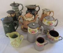 Various pewter lidded ceramic jugs and teapots etc