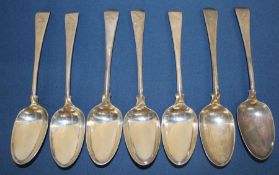 7 old English pattern silver dessert spoons engraved with a crest, London 18th century , maker