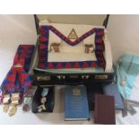 Leather briefcase containing assorted Masonic items inc aprons, books and medals (one silver gilt)