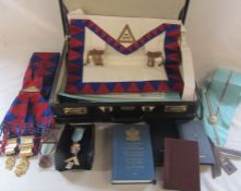 Leather briefcase containing assorted Masonic items inc aprons, books and medals (one silver gilt)