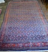 Thick pile blue ground Persian beshear carpet (stitched across the centre) 310cm by 165cm