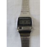 Vintage steel cased Seiko calculator wristwatch with digital dial on bracelet strap, the back