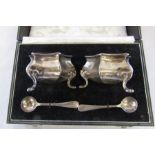 Cased pair of silver salts with green glass linings and spoons Sheffield 1906 weight (without
