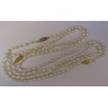 Natural form pearl necklace, length approximately 130 cm