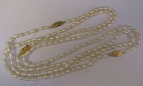 Natural form pearl necklace, length approximately 130 cm