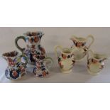 2 sets of graduated jugs inc Masons (tallest 19.5 cm)