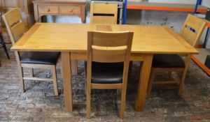 Modern oak fold over dining table (extending to 180cm by 90cm) with 4 chairs