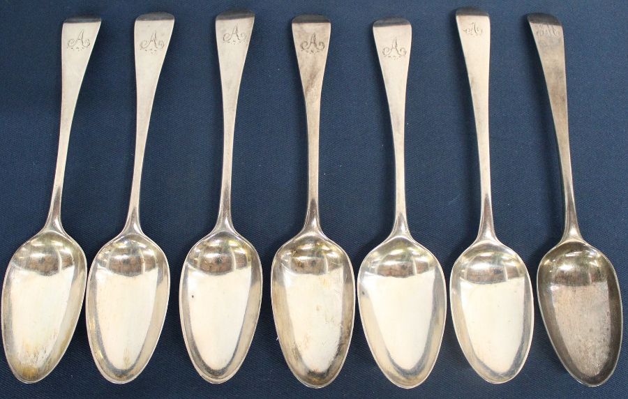 6 + 1 old English pattern silver dessert spoons with later engraved initial, London 1762 & 1824, 8.