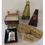 Boxed metronome, Mahjong set, graduated bamboo boxes and a pewter hip flask 'The field'