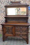 Late 19th  / early 20th century oak Green Man carved mirror back sideboard with cupboard and 3