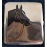 Continental silver (tested as) cigarette case with enamel horse head decoration & gilded interior