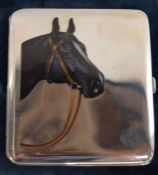 Continental silver (tested as) cigarette case with enamel horse head decoration & gilded interior